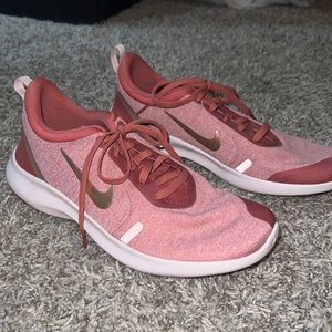 Size nine NIKE pink running shoes